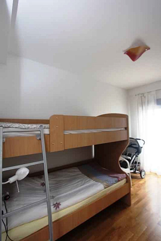 Eine Wohnung mit Meerblick in Rafailovici — photo 7